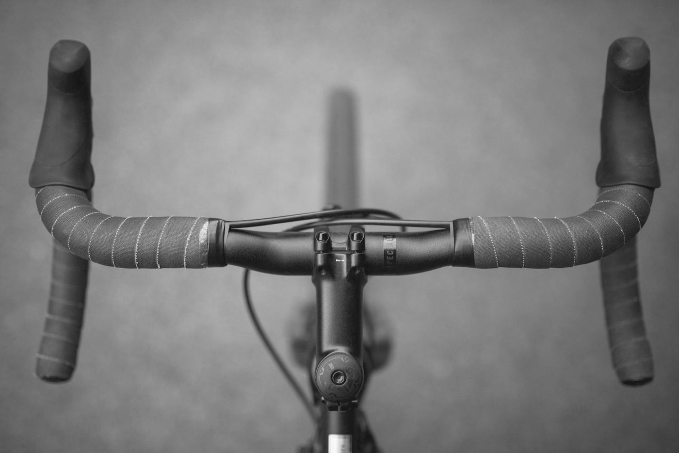 Close view of a road bike's handlebars and stem